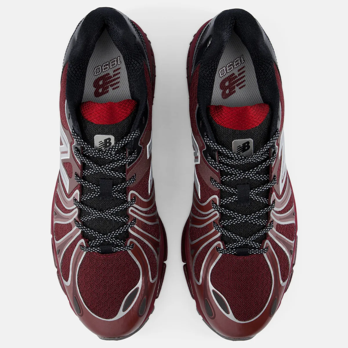 top-down view of pair, burgundy laces area with black tongue and '1890' branding on insole, Burgundy