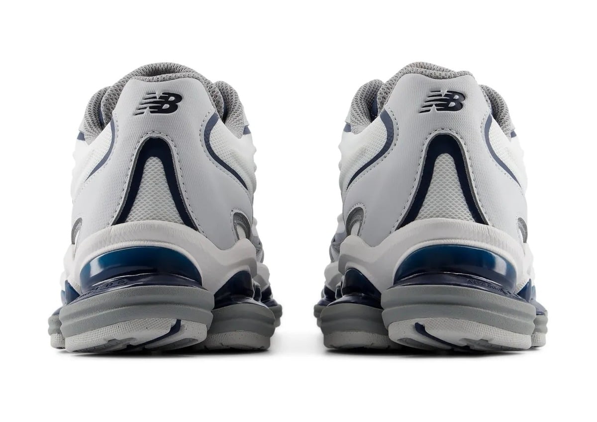 heel view pair, white uppers with navy NB logo and blue translucent heel inserts, White/Navy