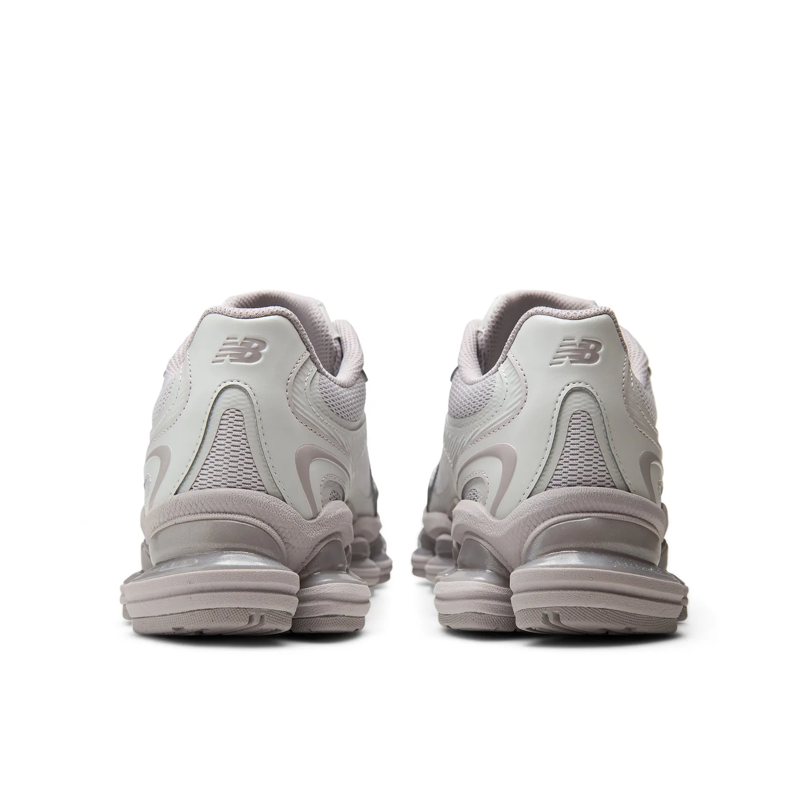heel view of pair, grey mesh with New Balance logo, ridged midsoles, Horizon Grey