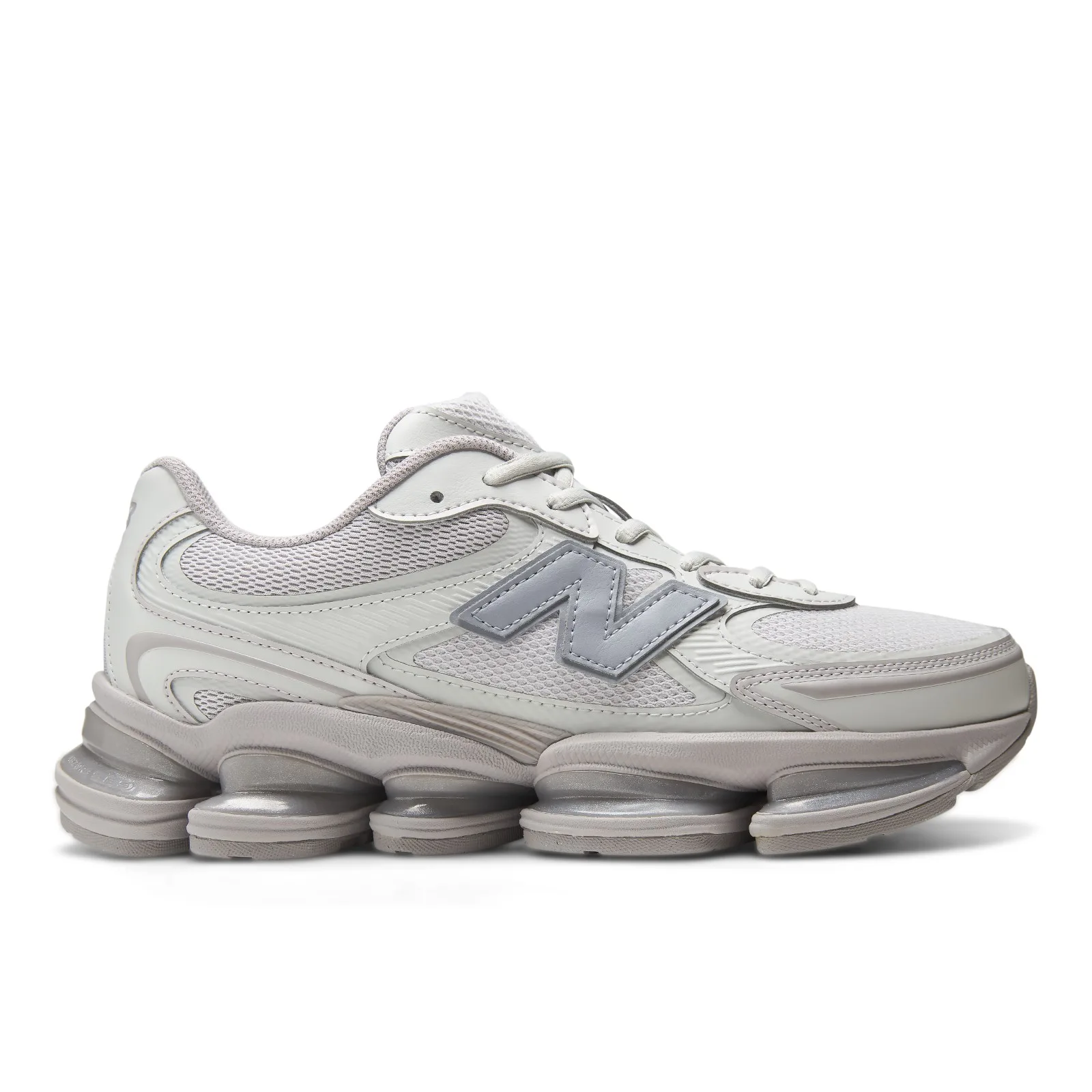 lateral view of single shoe, grey N logo, silver segmented ridged midsole, Horizon Grey