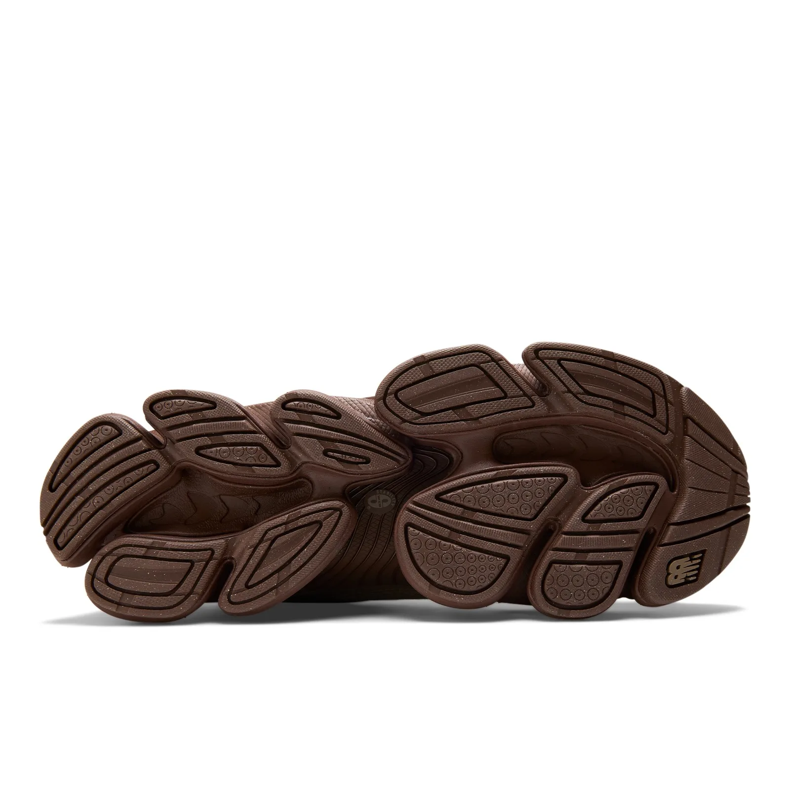 outsole view, dark brown segmented rubber tread with embossed NB logo, Thunder Brown