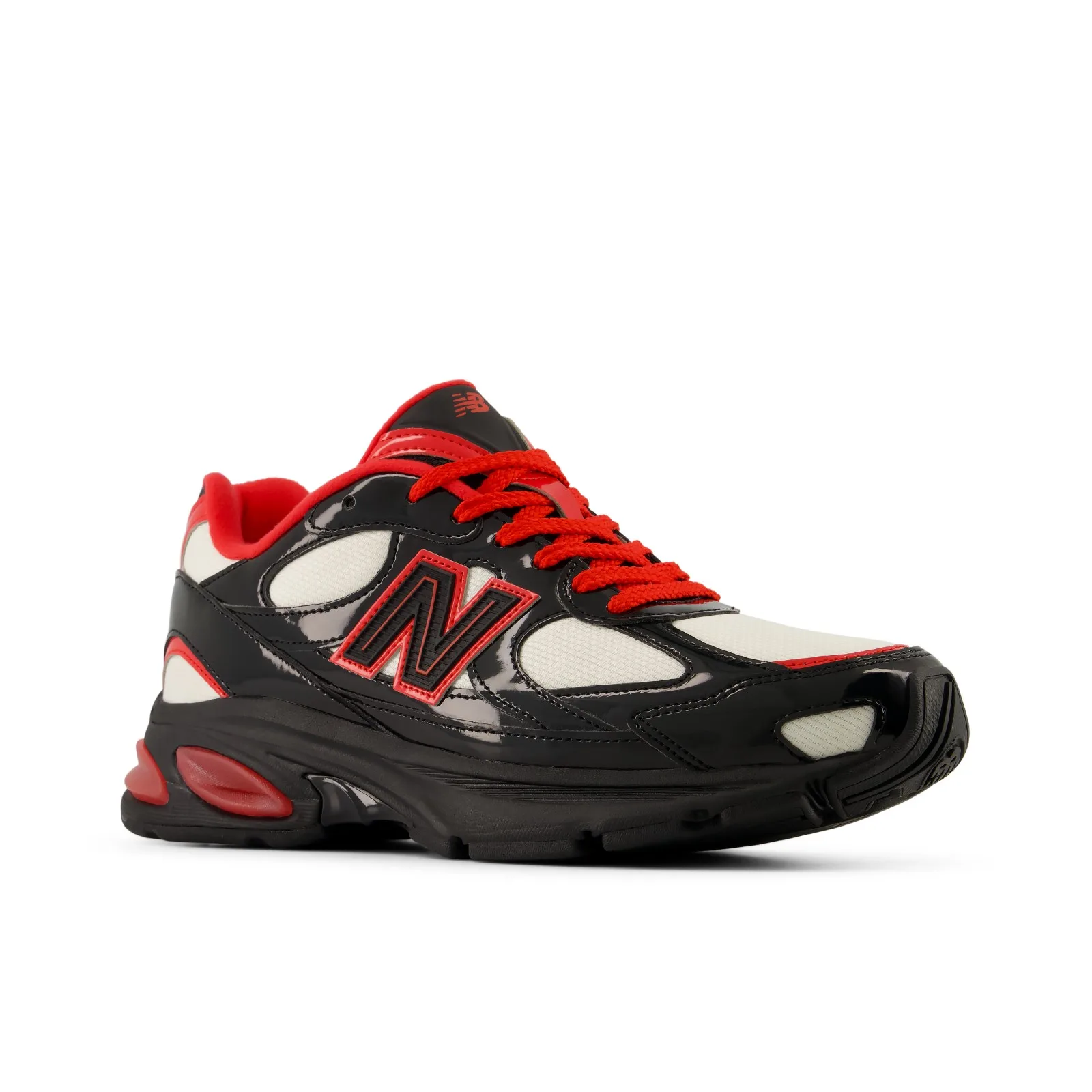 Angled toe-lateral view, black and white upper with red laces and N branding, Firecracker