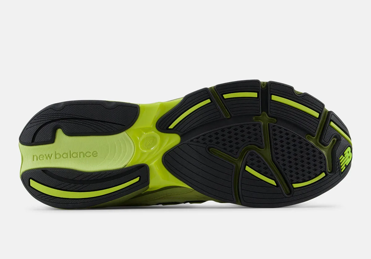 outsole view, black rubber tread with lime green accents and New Balance text, Neon Green
