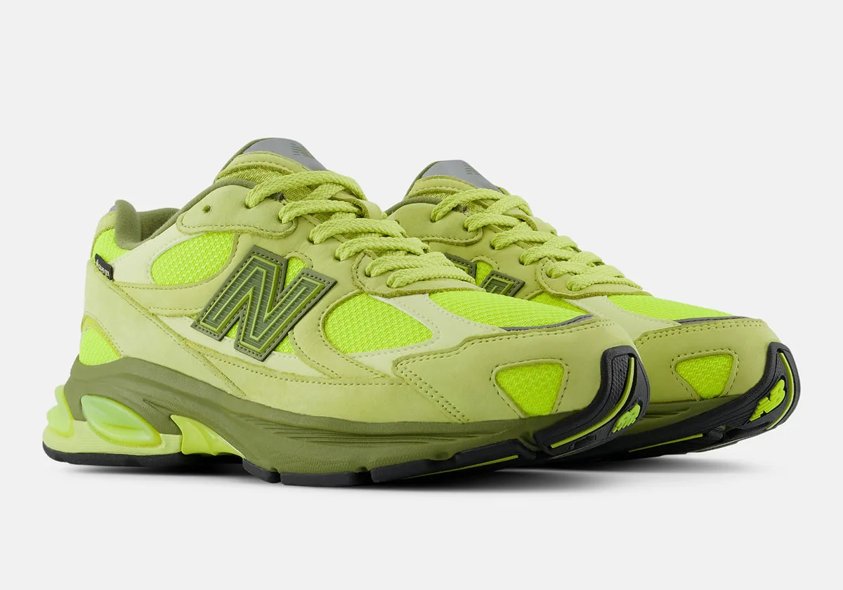 pair at an angle, olive N logo and neon green mesh panels visible, New Balance 2010 GORE-TEX "Neon Green"