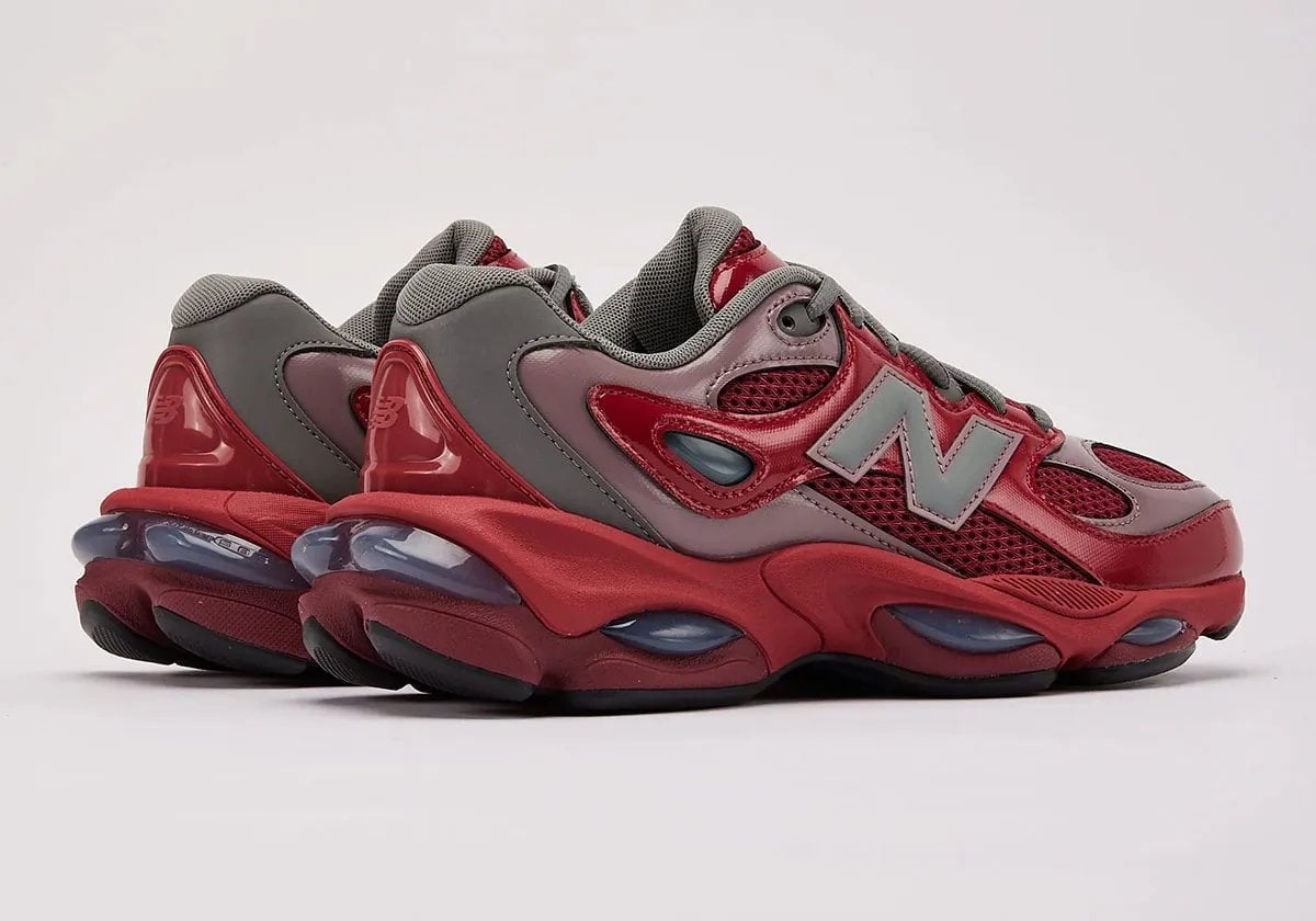 front three-quarter pair view, red mesh toe and grey N logo on both shoes, Red Patent