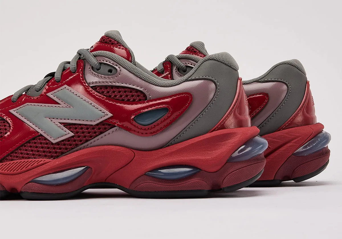 close-up rear-angled view showing patent red overlays and grey heel panels, pair, Red Patent