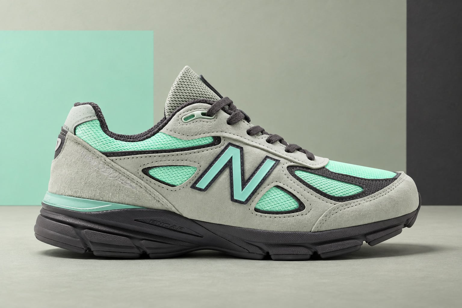 lateral view, grey suede with mint green mesh panels and teal N logo, outdoor, New Balance 990v4 “Silver Moss/Bright Mint”