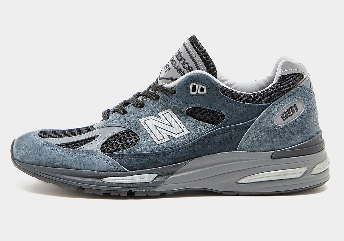 lateral view, slate blue suede and black mesh with silver N logo on white background, Elevated Essentials