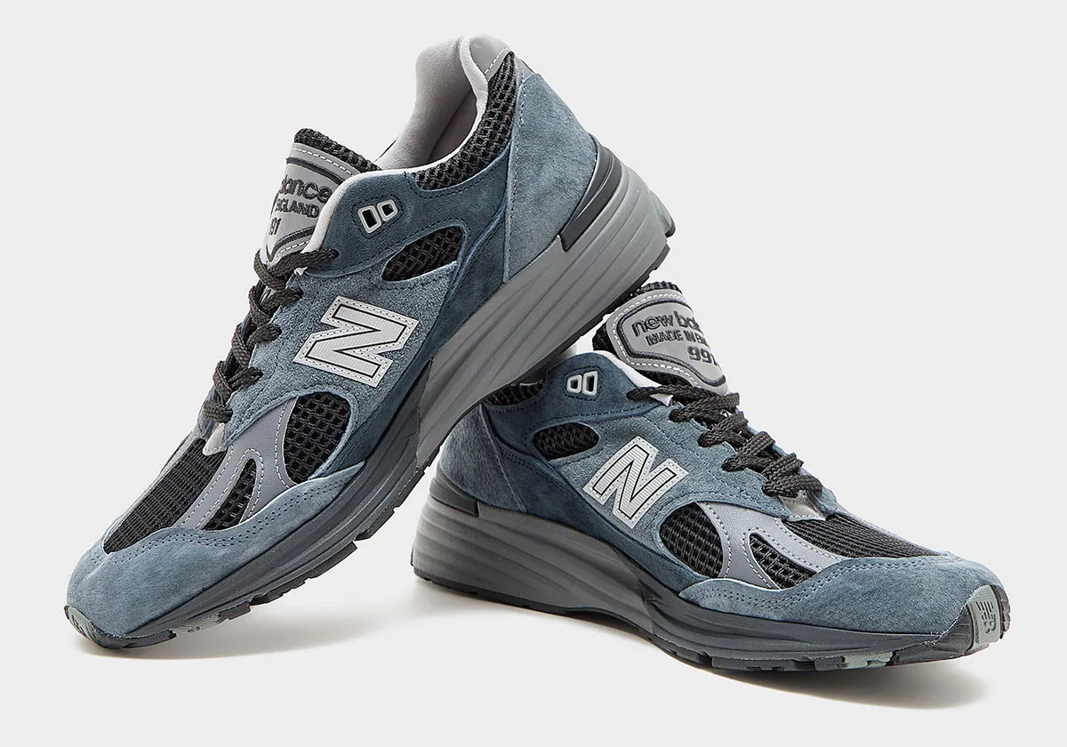 pair shown stacked, slate blue suede with black mesh vents and grey FuelCell midsole, Elevated Essentials