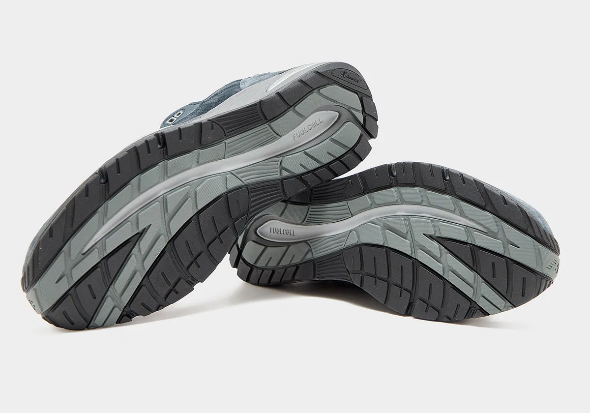 outsole view of both shoes, black and grey FuelCell tread pattern, Elevated Essentials