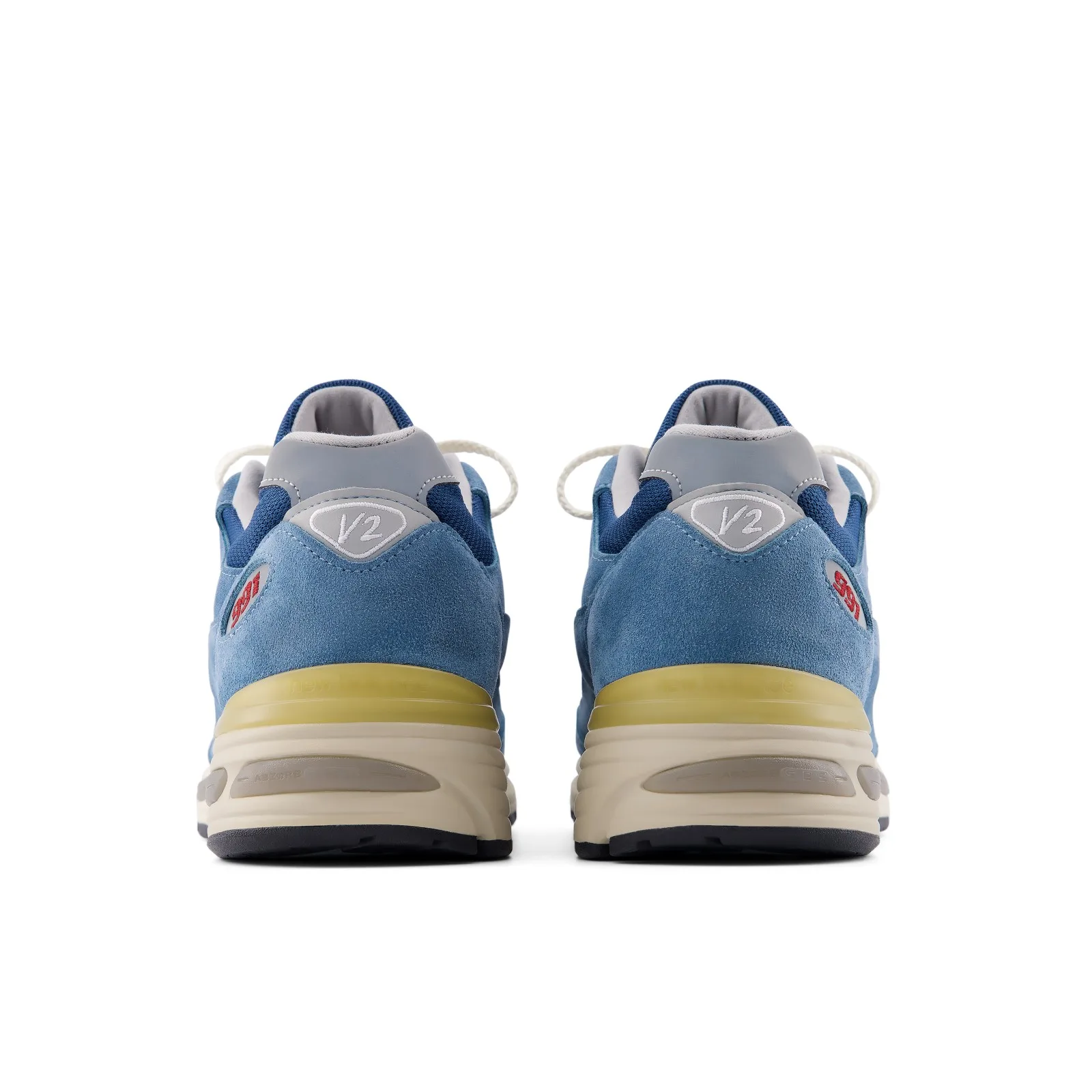 heel pair view, blue suede with red 991 branding and cream midsoles, Poseidon