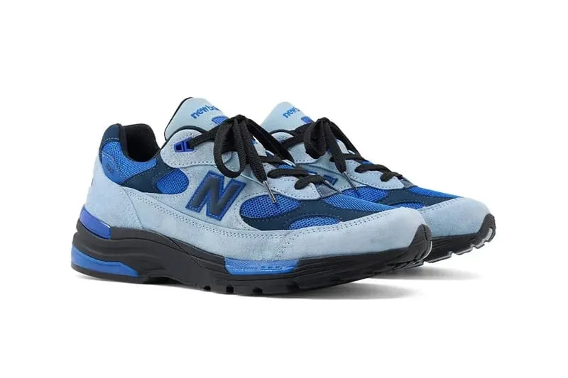 three-quarter front view of pair, light blue suede with royal blue mesh overlays, Blue Gemstone