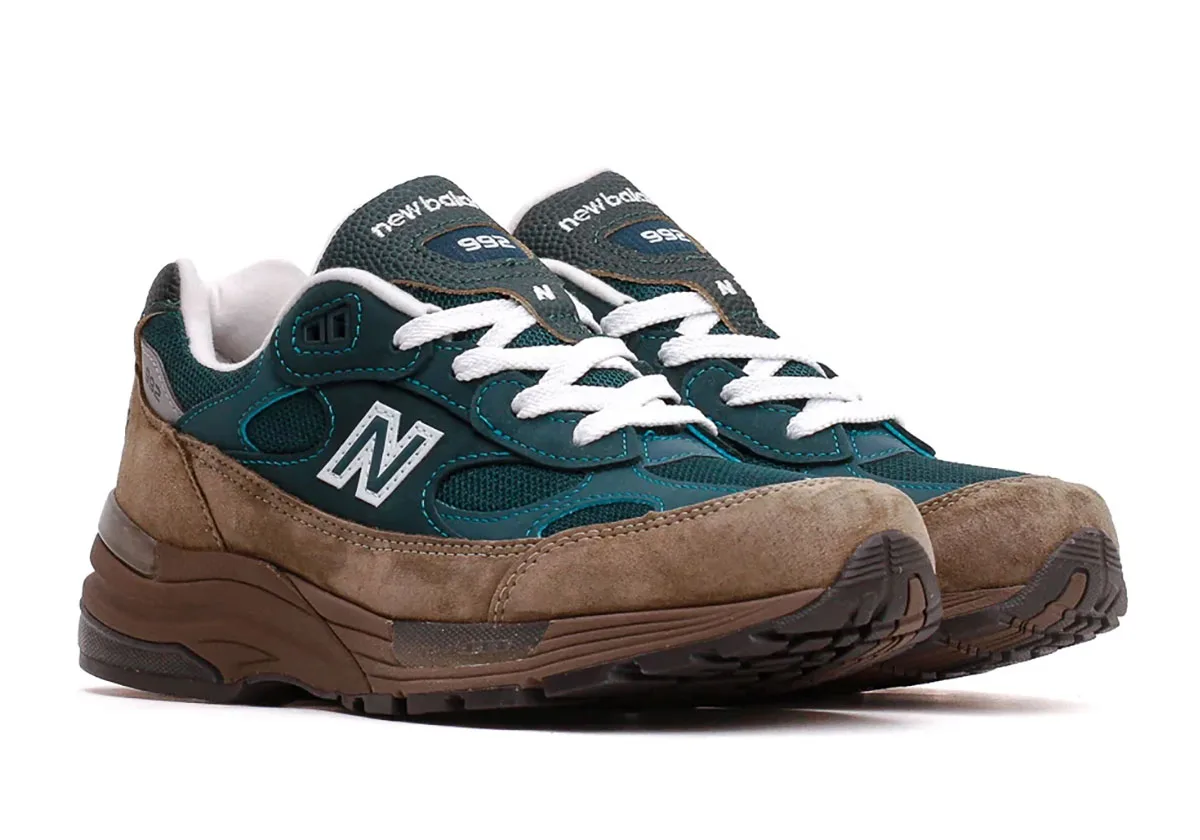 front angled view of pair, teal upper, tan suede toe, white laces, Medusa Green