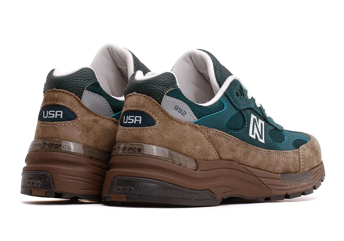 heel view of pair, tan suede heel with USA flag patch and 992 tab, Medusa Green