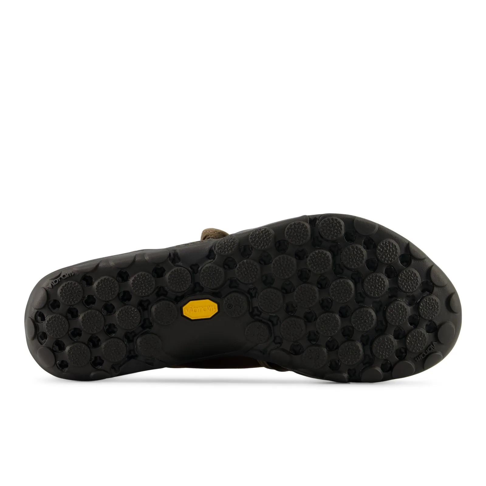 outsole detail, black lugged Vibram sole with yellow Vibram logo tab, Soft Utility