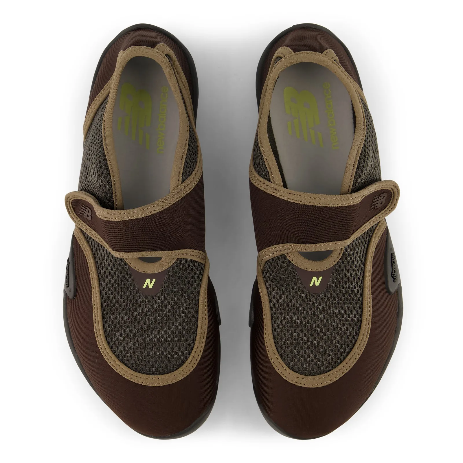 top-down pair view, olive mesh with tan piping and green New Balance branding on insole, Soft Utility