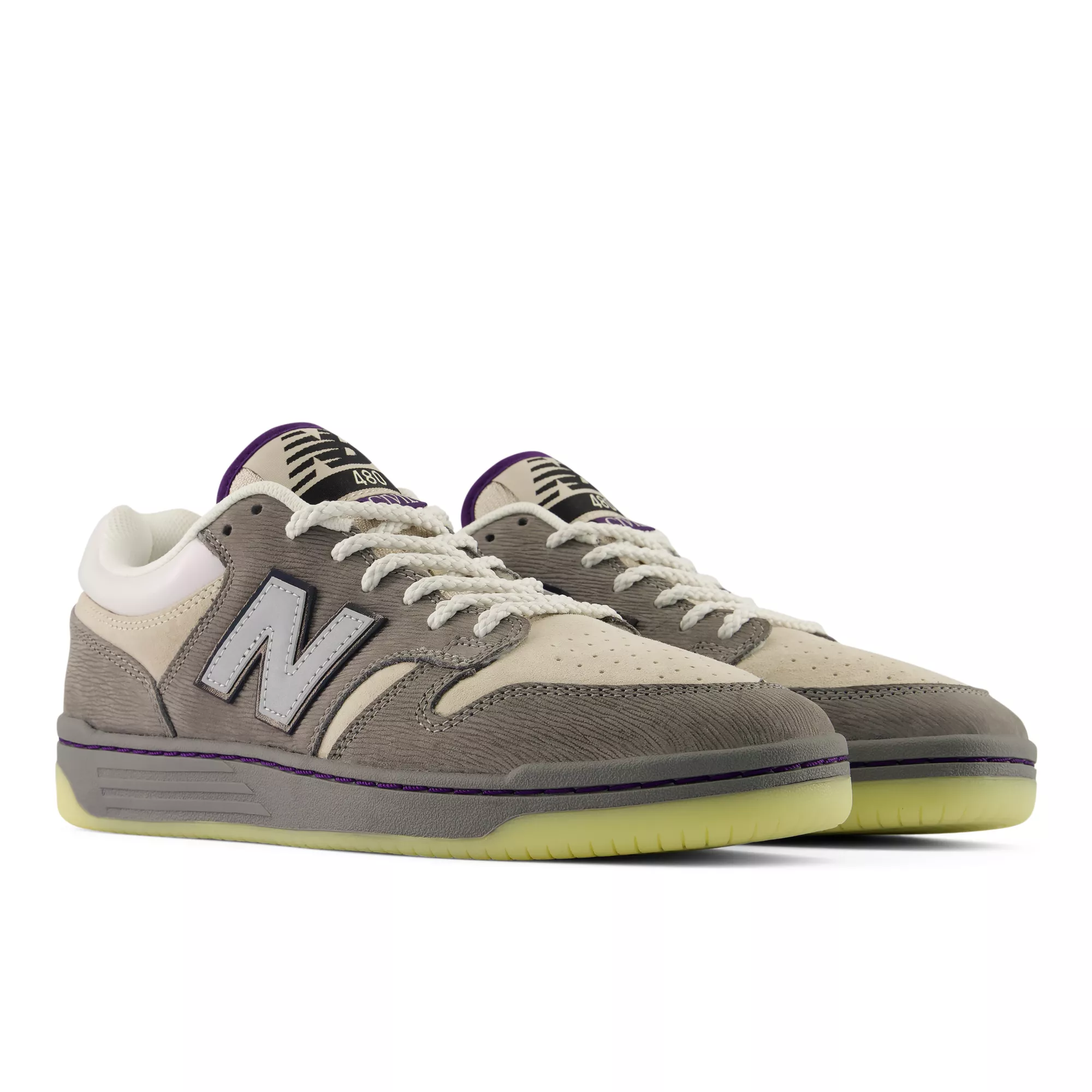 Angled view of the Civil New Balance 480 pair with grey suede, cream mesh and pale green soles
