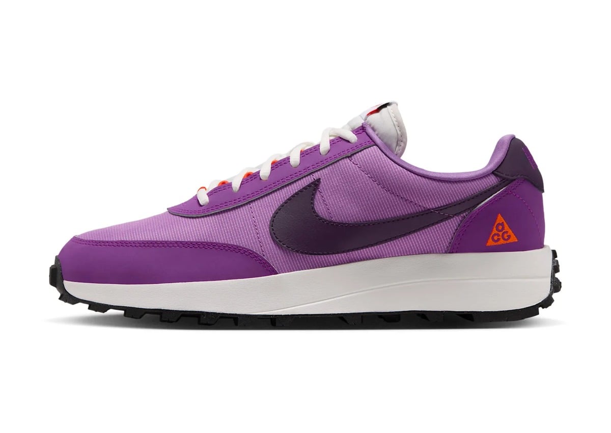 Lateral view, purple upper with plum swoosh and orange ACG triangle logo, Monarch Purple