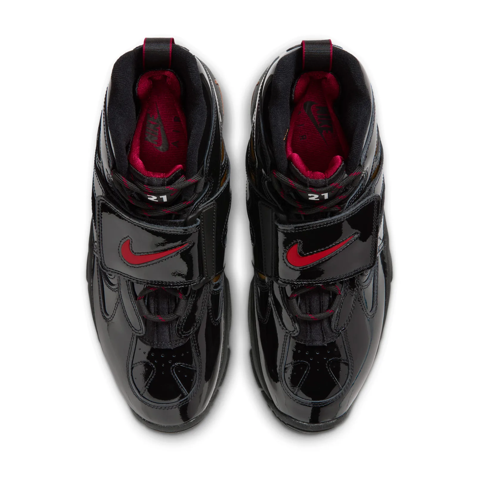 top-down pair view, black patent uppers with red swoosh straps and burgundy lining, Black Patent