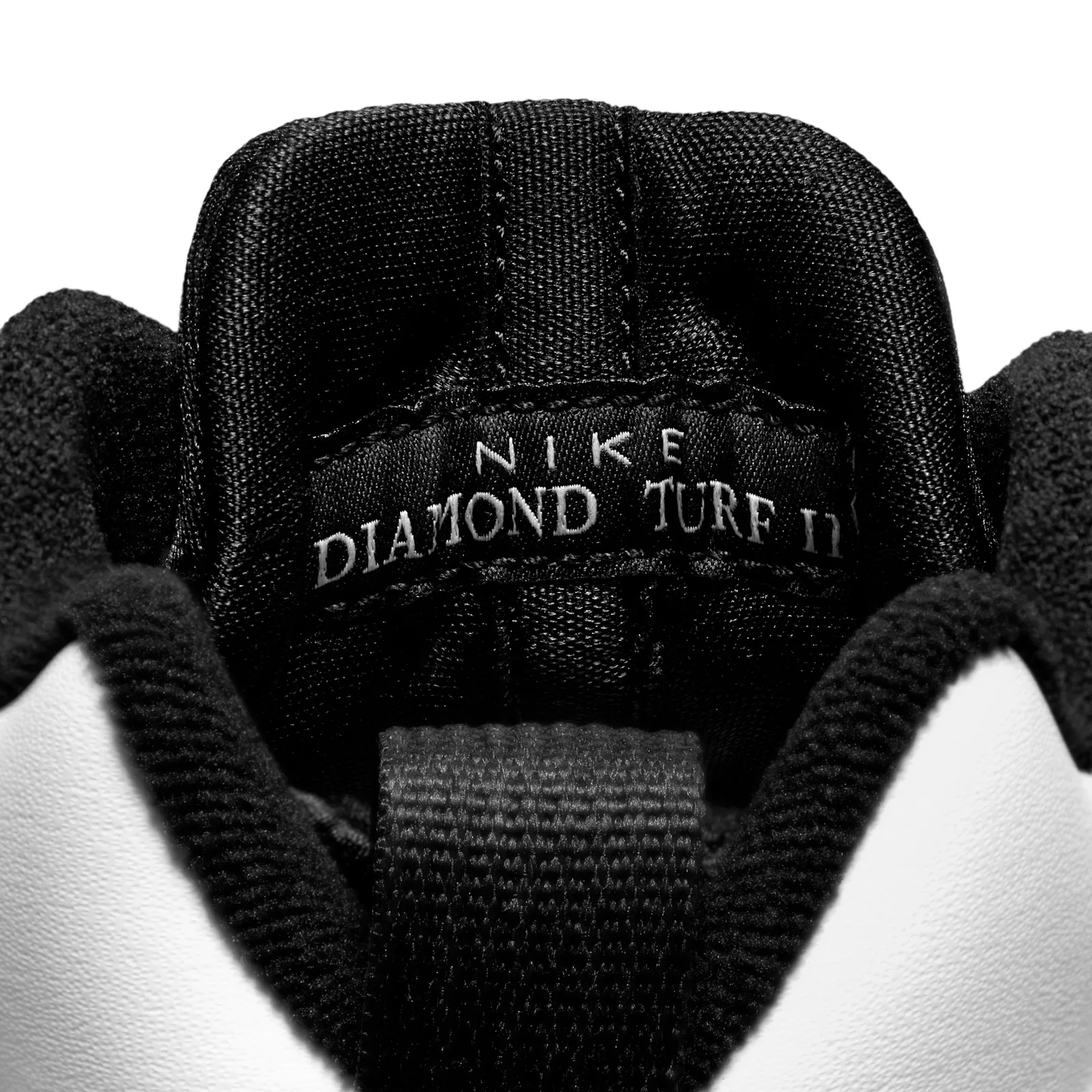 close-up forefoot detail, black mesh cutouts and PRIME tongue tag, White/Black