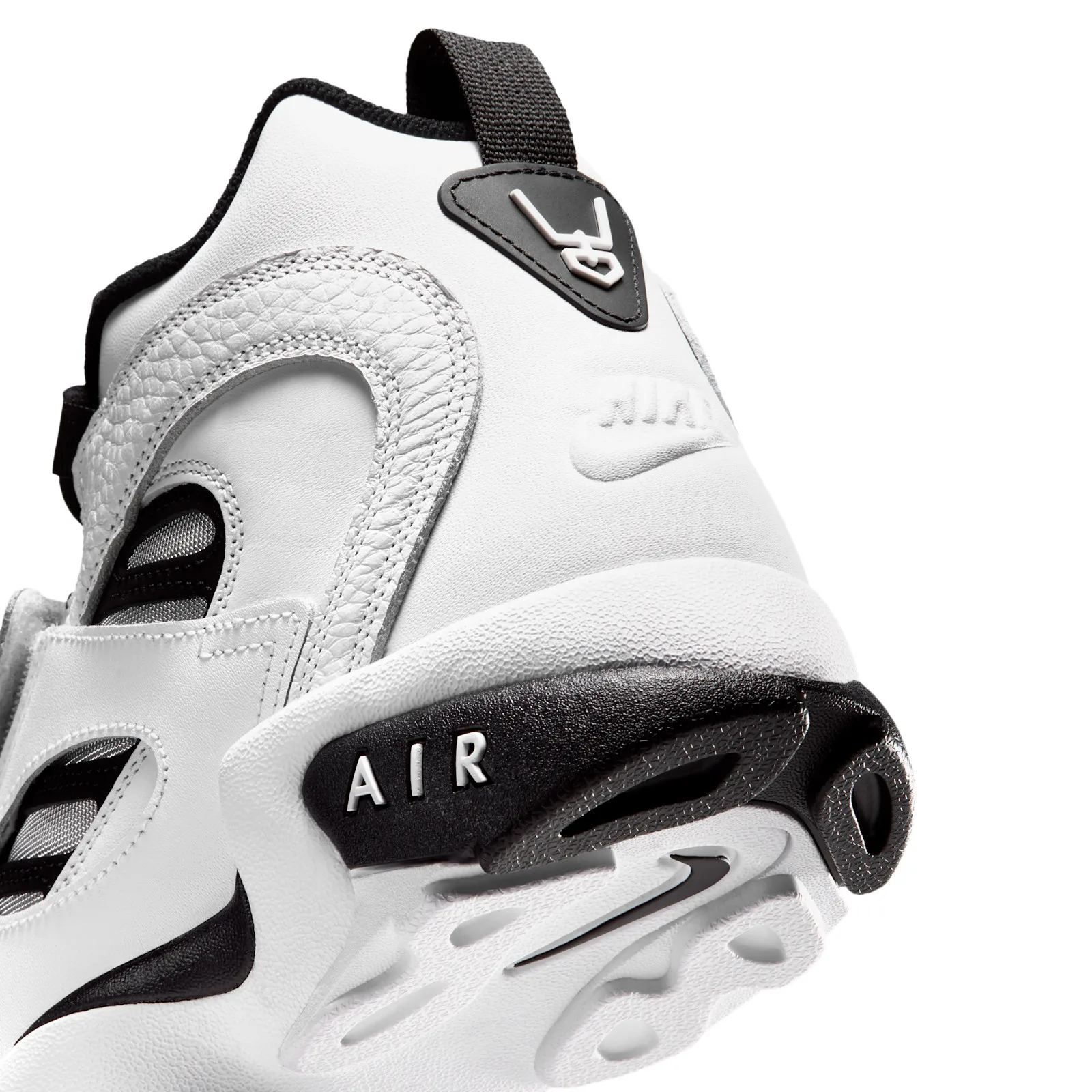 close-up heel detail, black pull tab and AIR text on midsole, White/Black