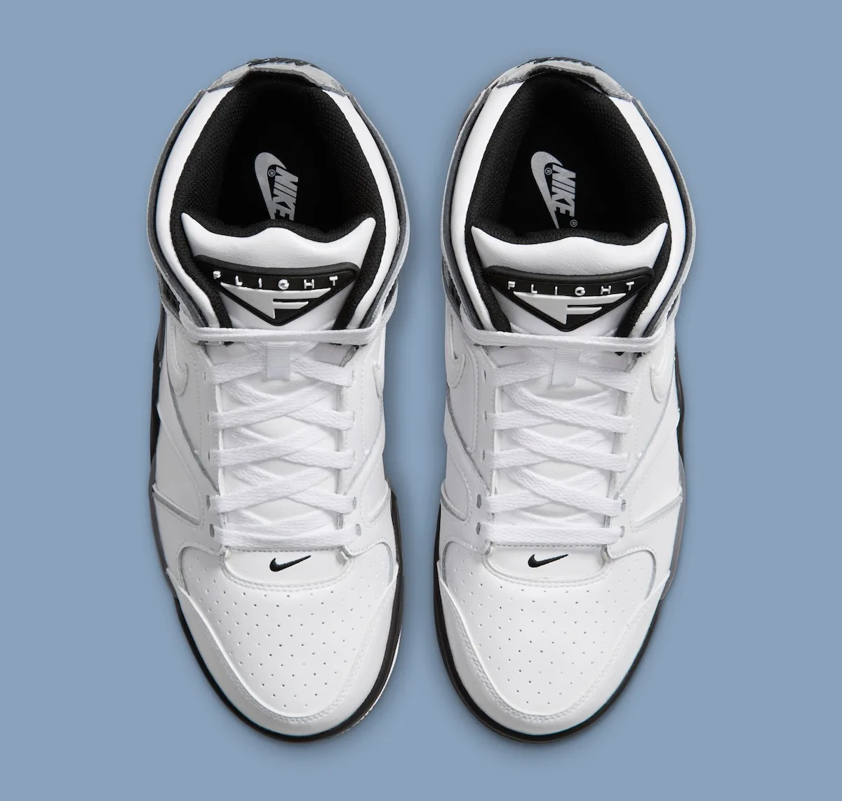 pair, top-down view, white upper with black tongue and FLIGHT branding, Air Flight Falcon