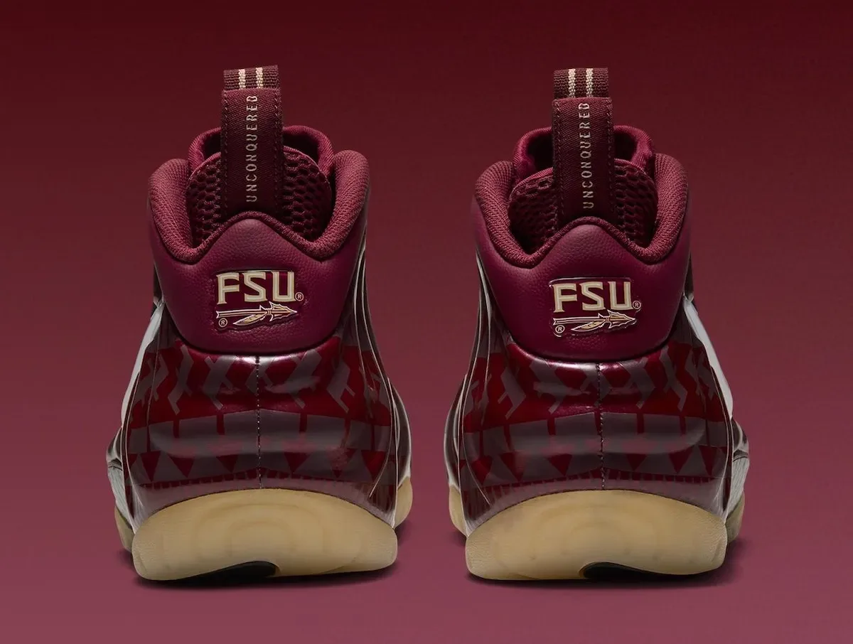 heel view of the pair showing gold FSU logos with arrowhead on maroon tabs, FSU