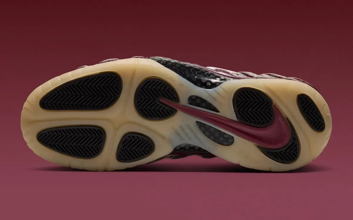 outsole view with maroon pivot circle, black traction pods and gum sole, FSU