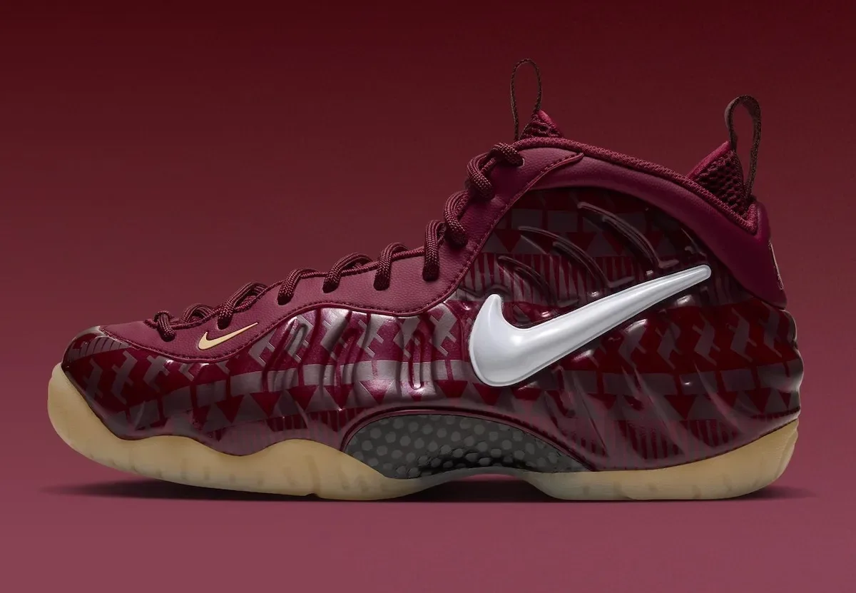 lateral side view showing white swoosh and gold-outlined mini swoosh on maroon, FSU