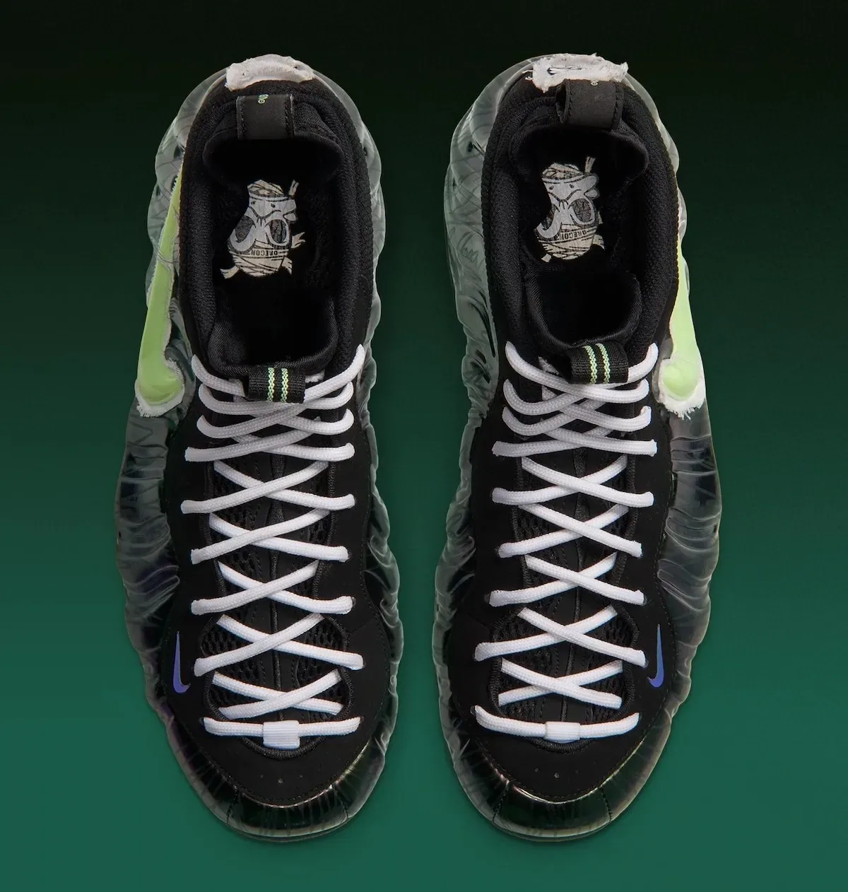 top-down view of laced pair with duck graphic on black insoles, Mummy Duck