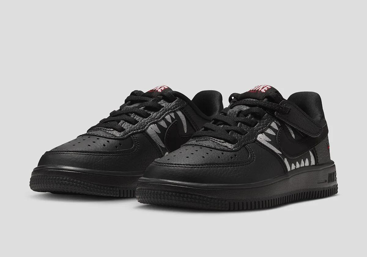 pair, angled front view showing matching teeth graphics on both shoes, Beast