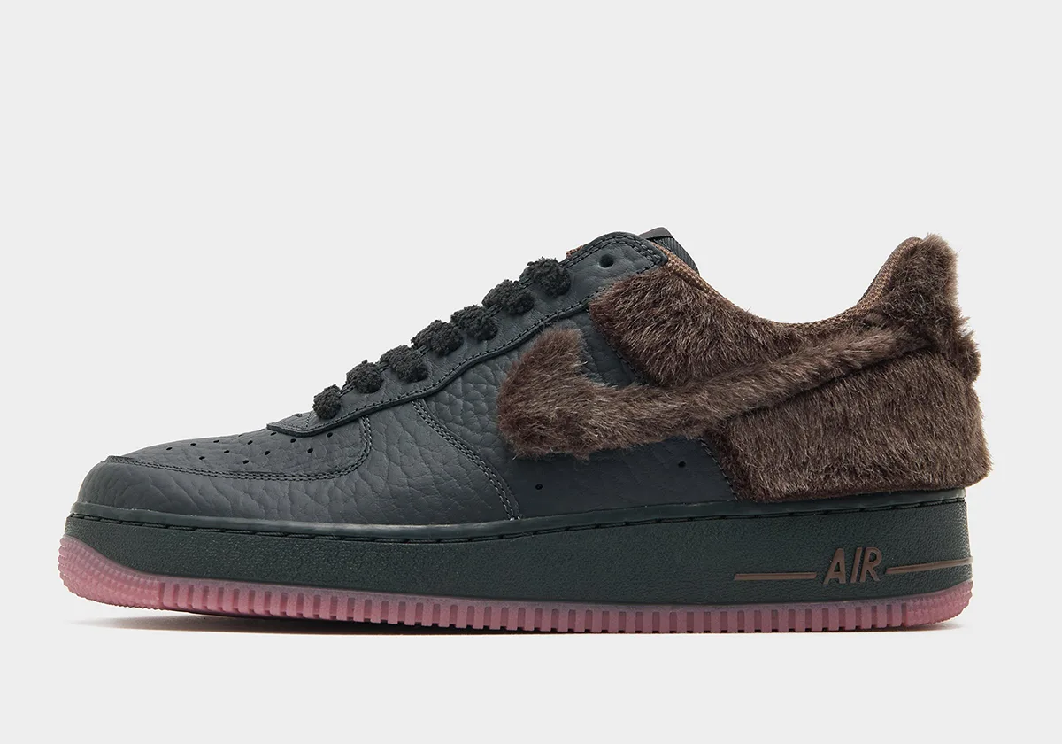 lateral side view, dark grey leather with brown faux fur overlay and swoosh, Black Rat