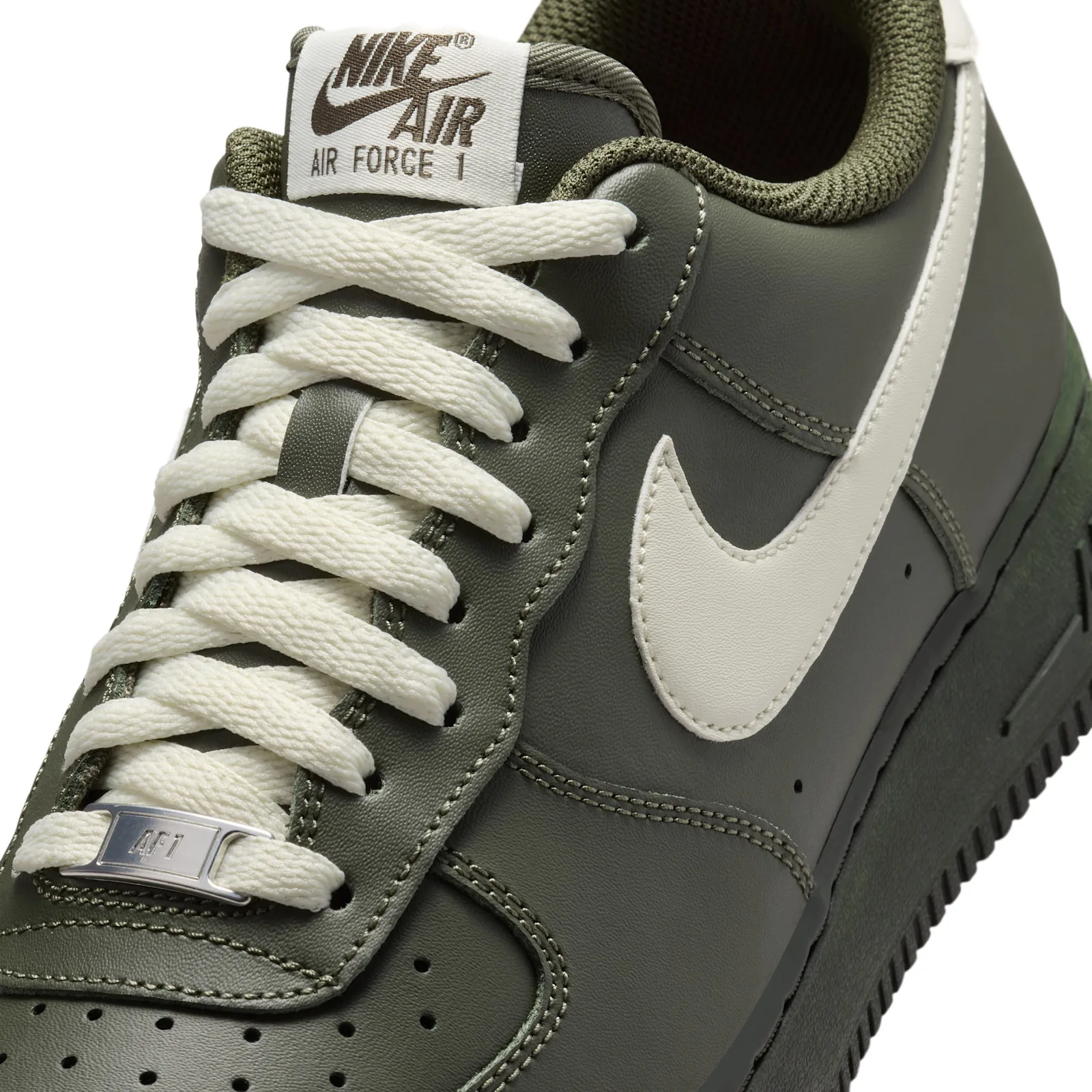 Close-up of laces and toe, cream Swoosh, olive eyelets, metal AF1 lace tag, Cargo Khaki