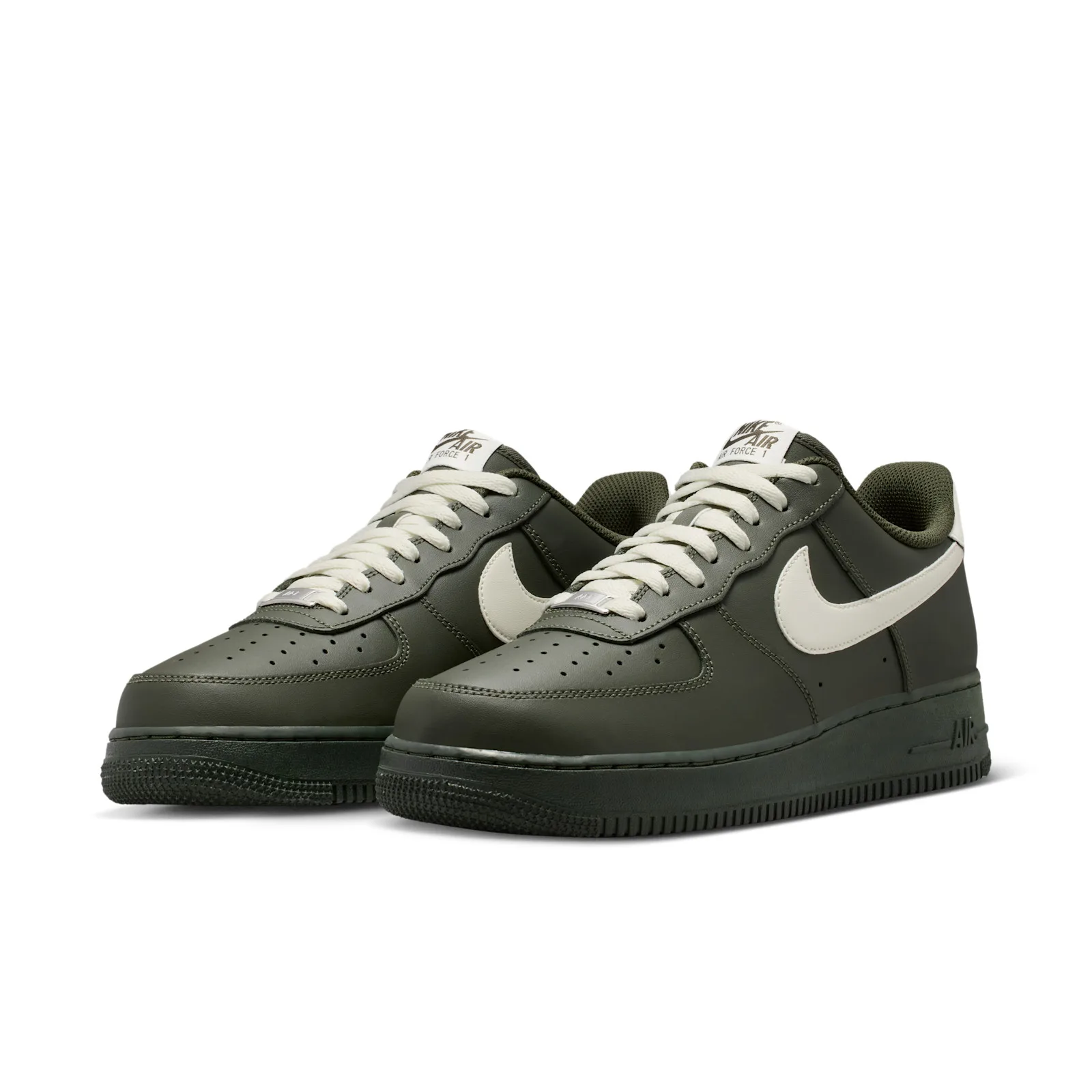 Front three-quarter view of the pair, olive green with cream Swooshes, Cargo Khaki