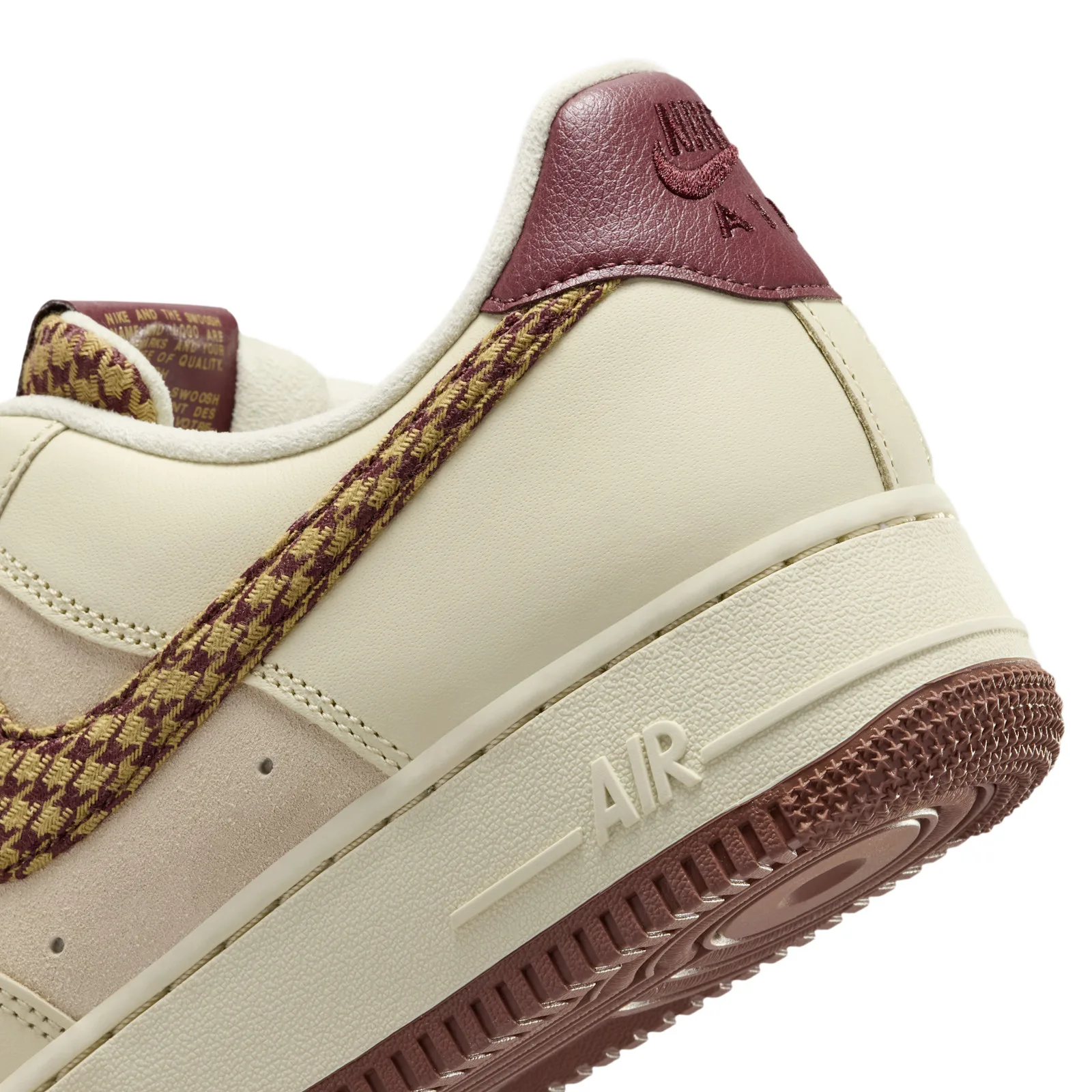 close-up heel detail, burgundy leather patch with embroidered Nike Air logo, Houndstooth