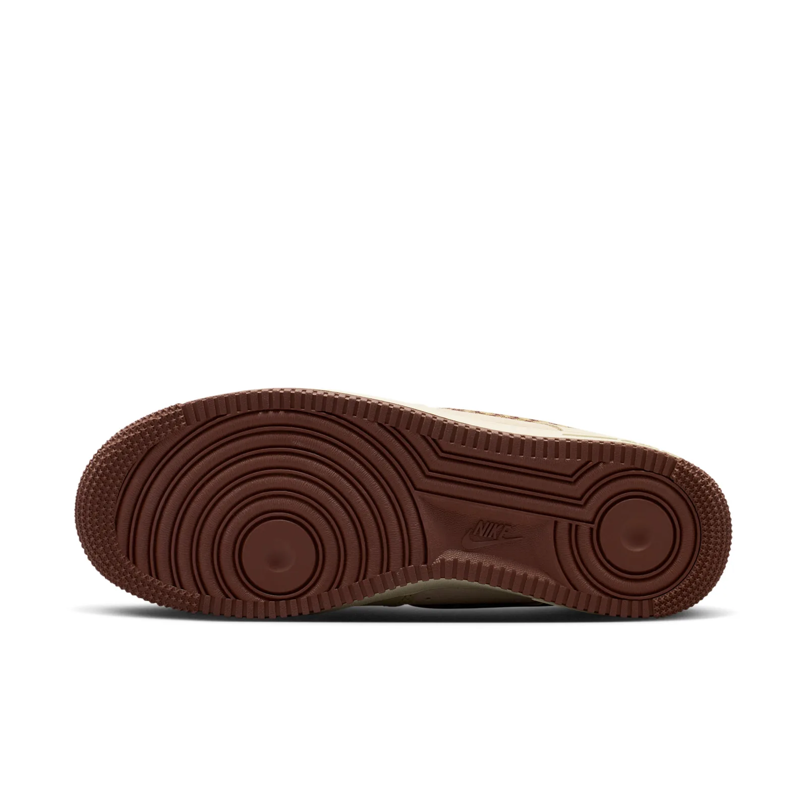 outsole view, brown gum rubber sole with circular tread pattern and Nike logo, Houndstooth
