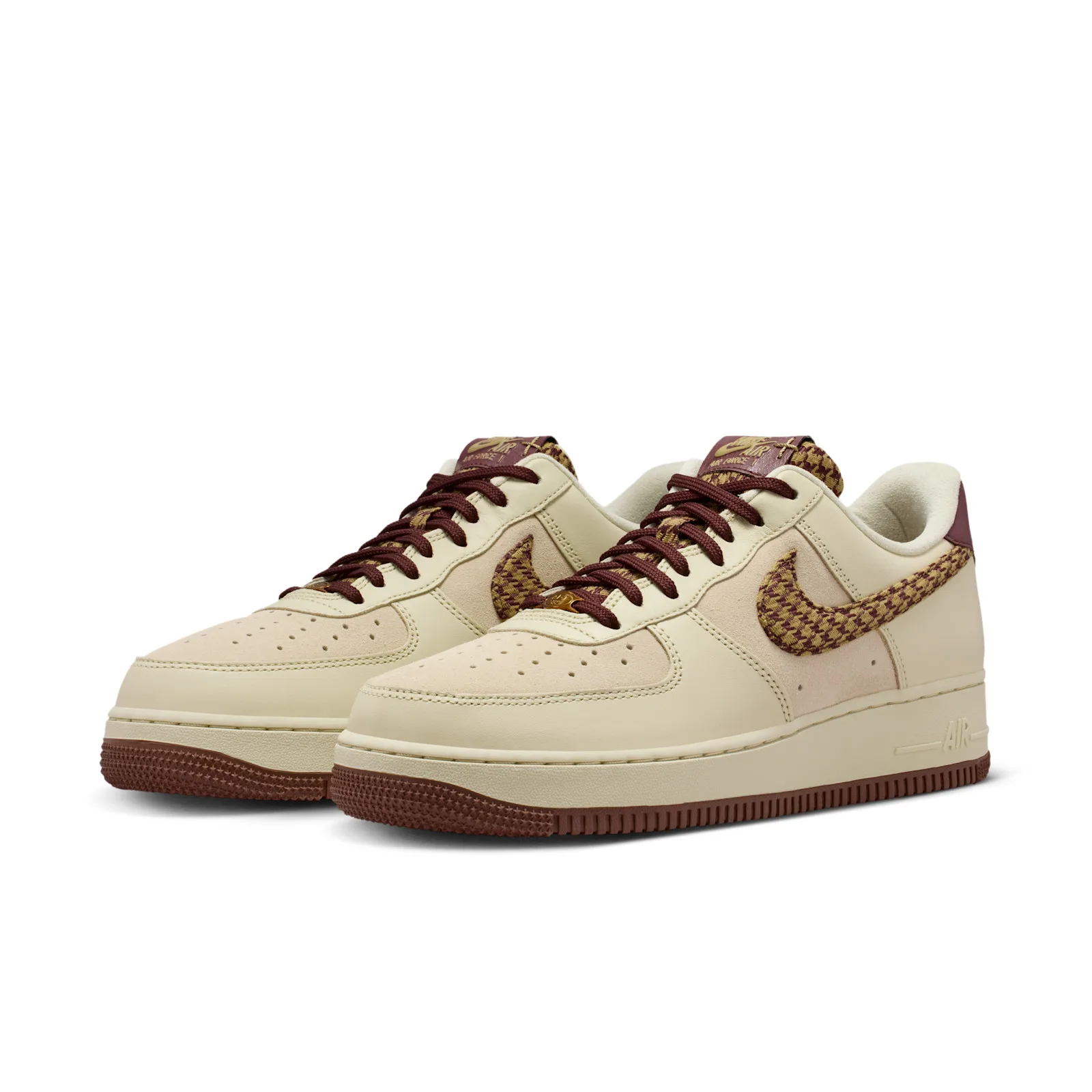 front angled pair view, cream sneakers with burgundy laces and houndstooth swooshes, Houndstooth