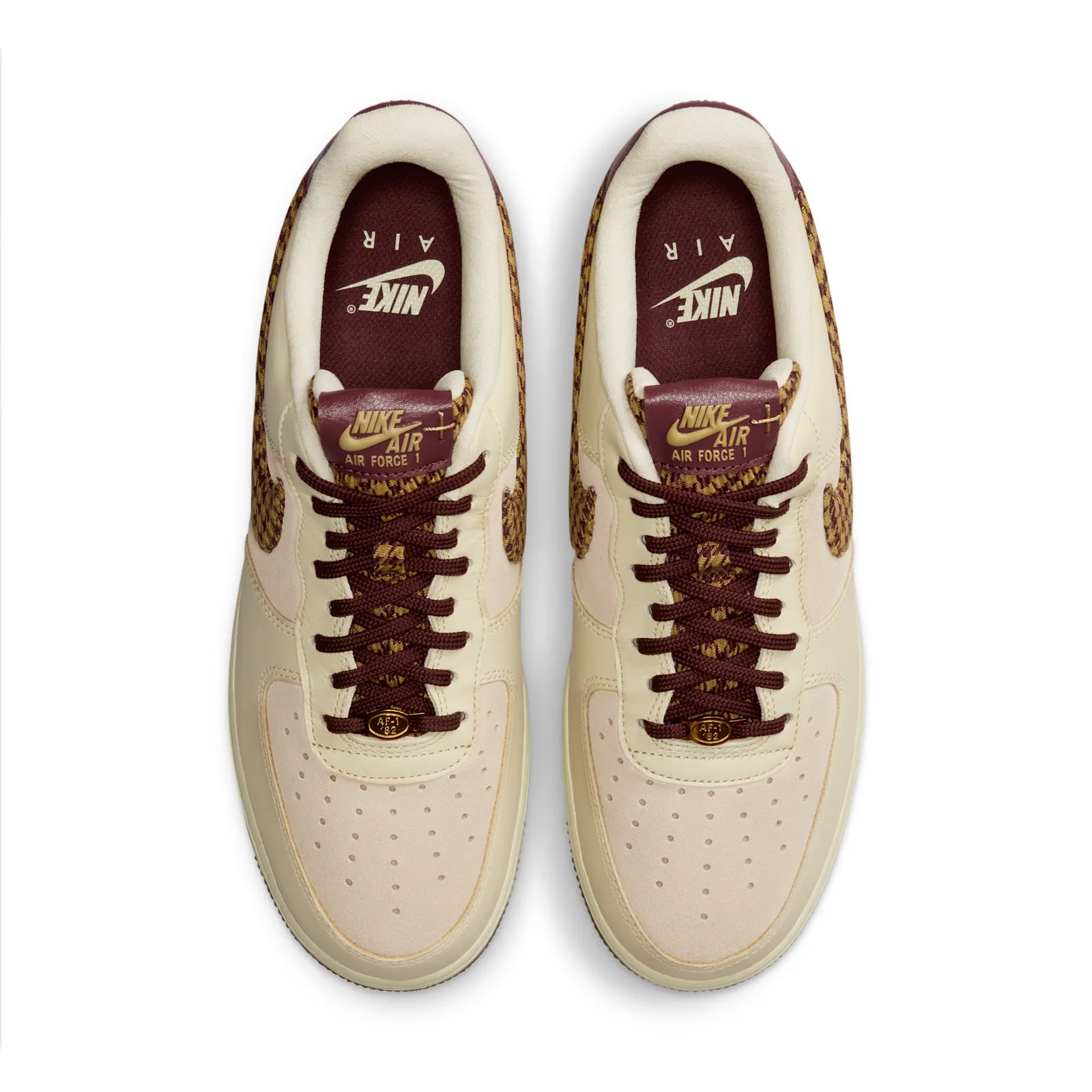 top-down pair view, burgundy laces and houndstooth-lined tongues with gold lace tips, Houndstooth