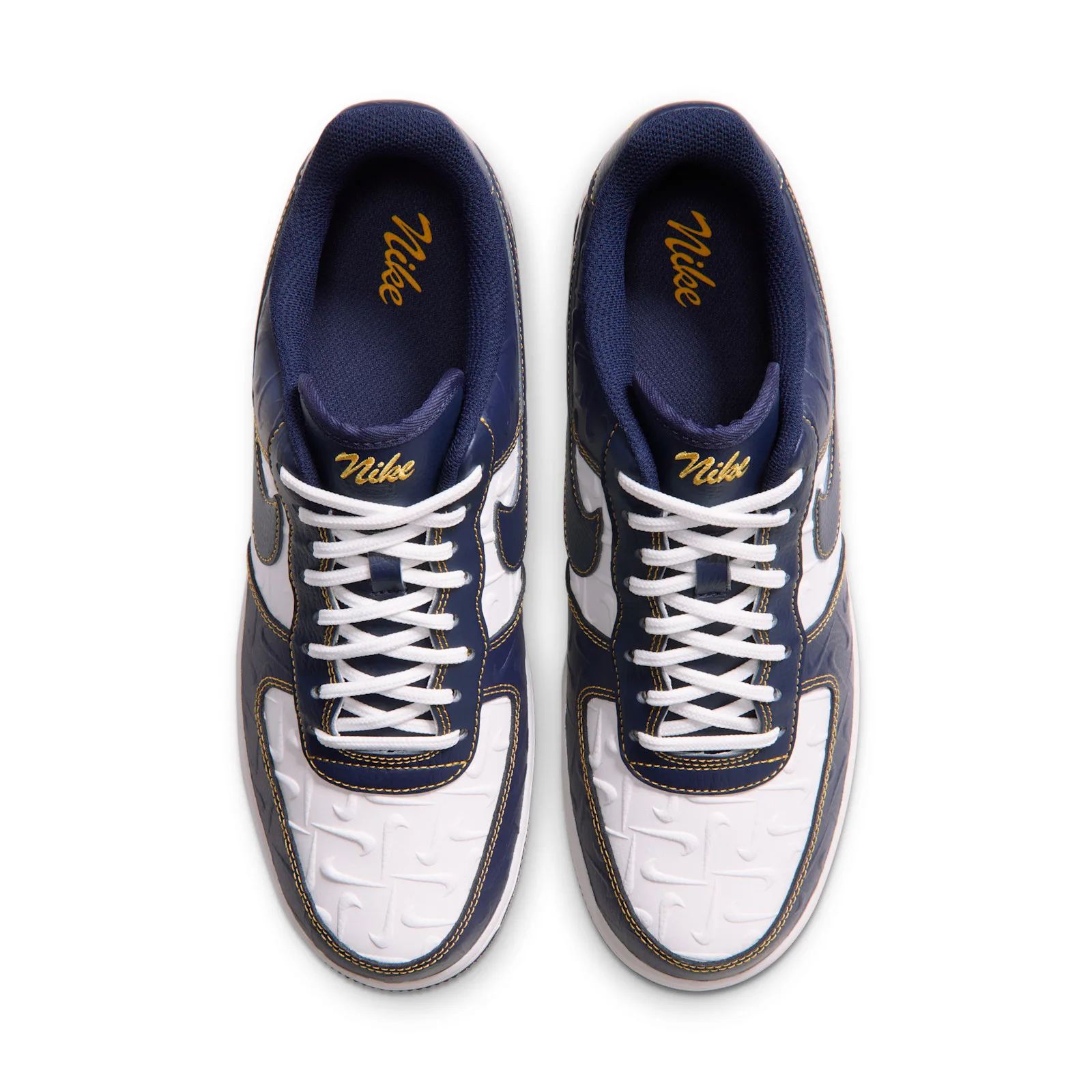 top-down view of the pair, gold Nike script on navy tongues, Low Mini Swoosh