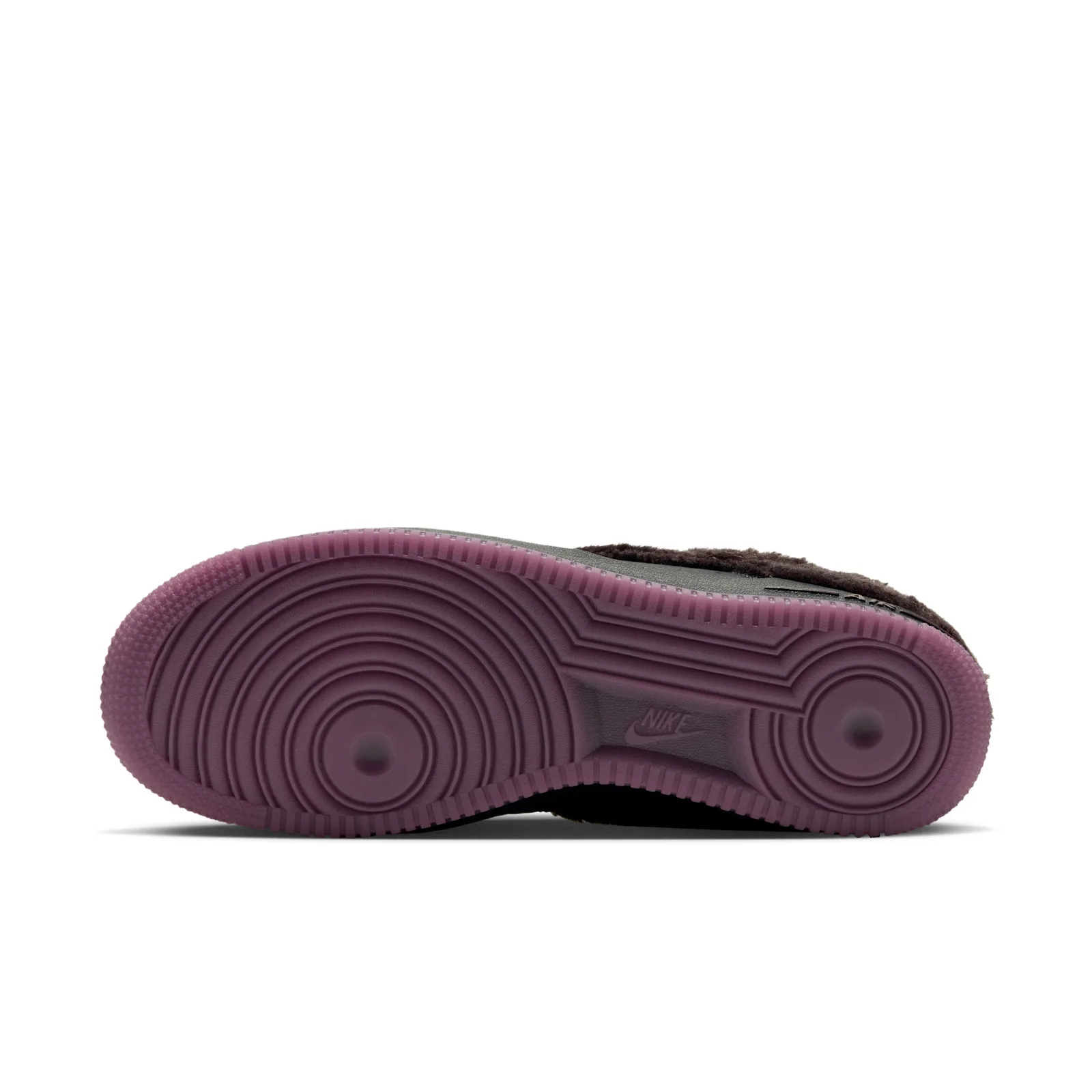 outsole close-up, translucent purple tread with Nike branding, NYC Rat