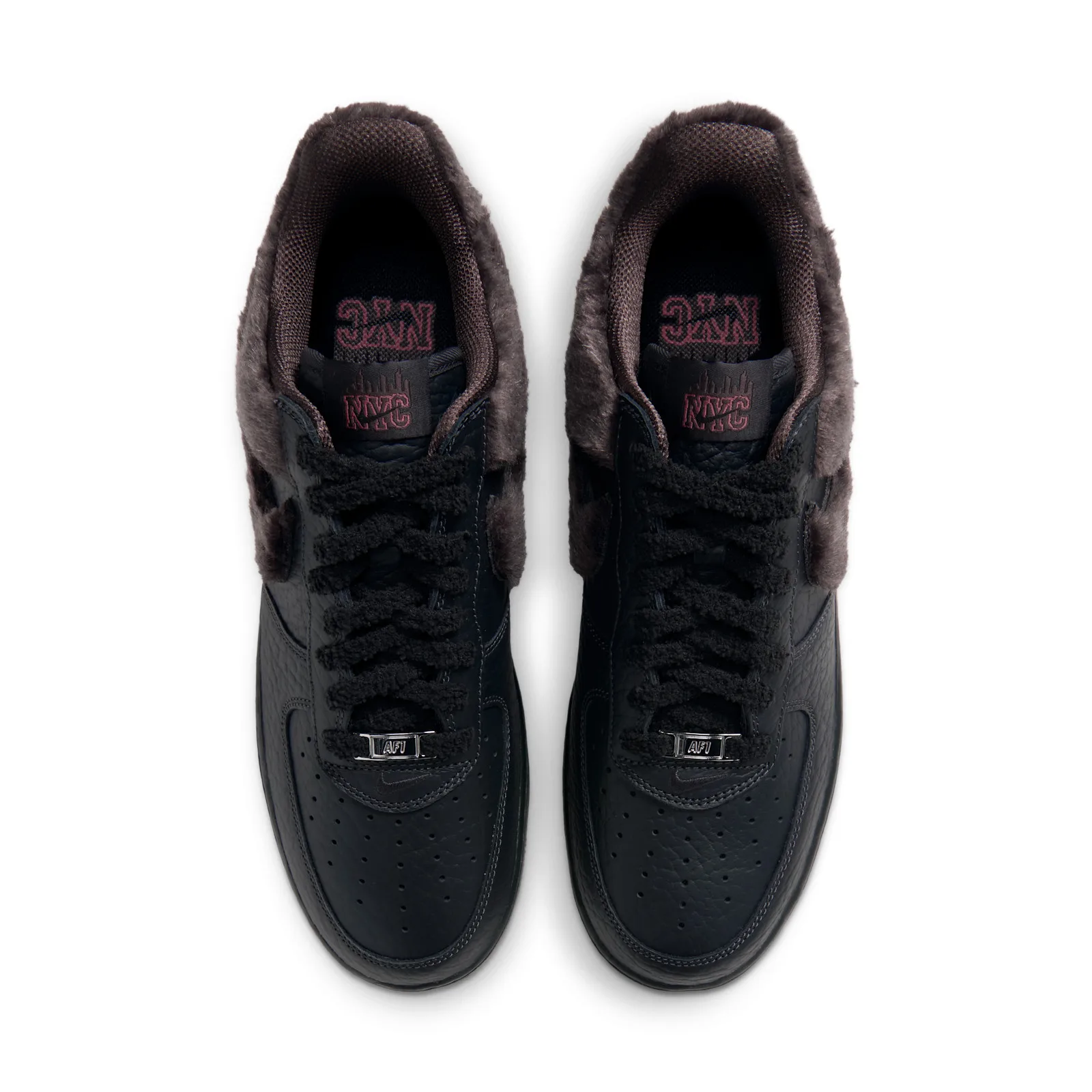 top-down pair view, black leather toes, fur collars, pink NYC text on tongues, NYC Rat