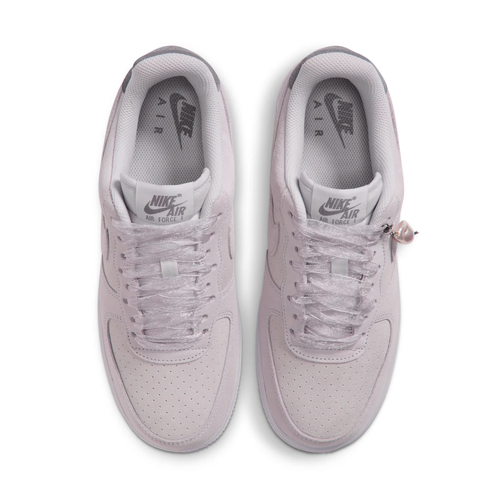top-down view of a pair, sheer ribbon laces, grey Air Force 1 tongue tags, Vast Grey