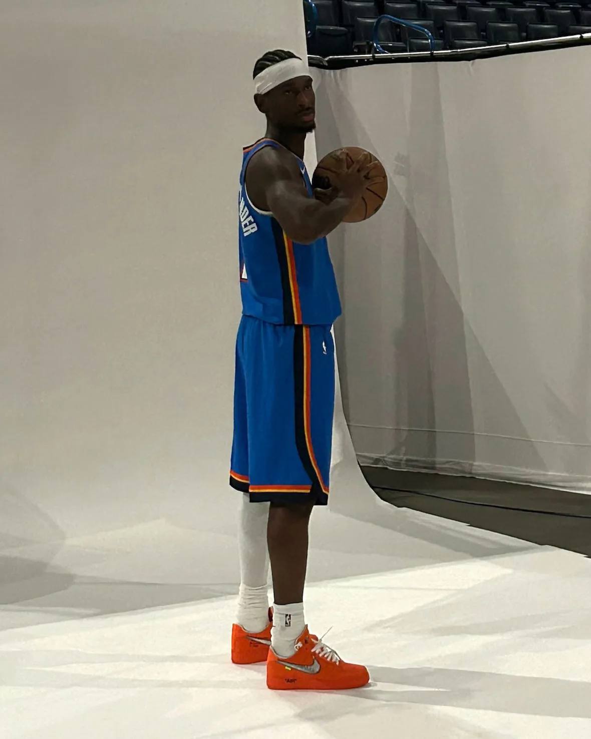 on-foot lateral view worn with blue jersey during photoshoot, Abloh Archive (Orange)