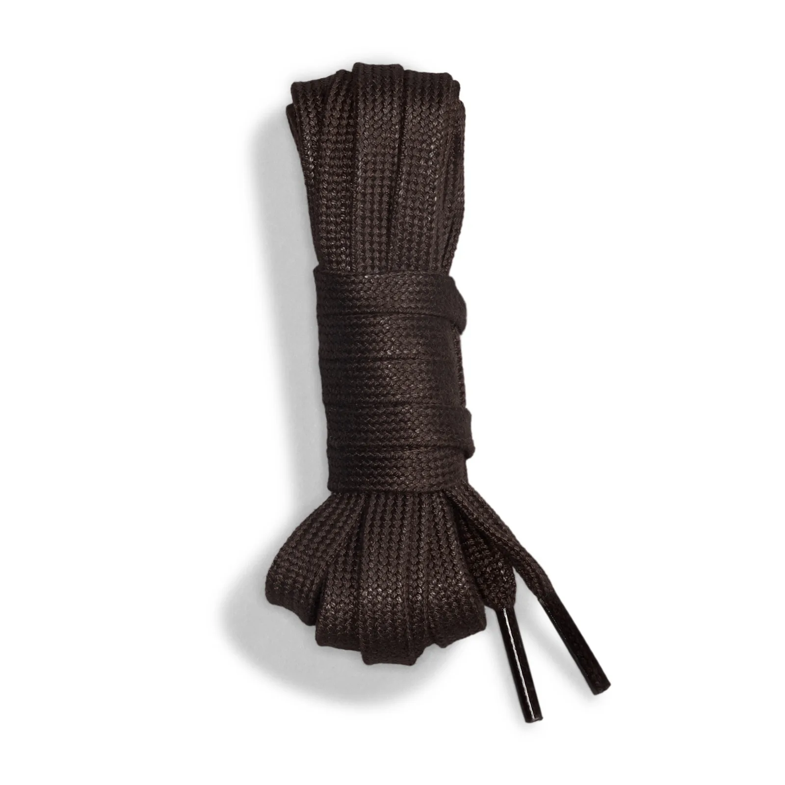 coiled brown flat laces alone against white background, Workboot