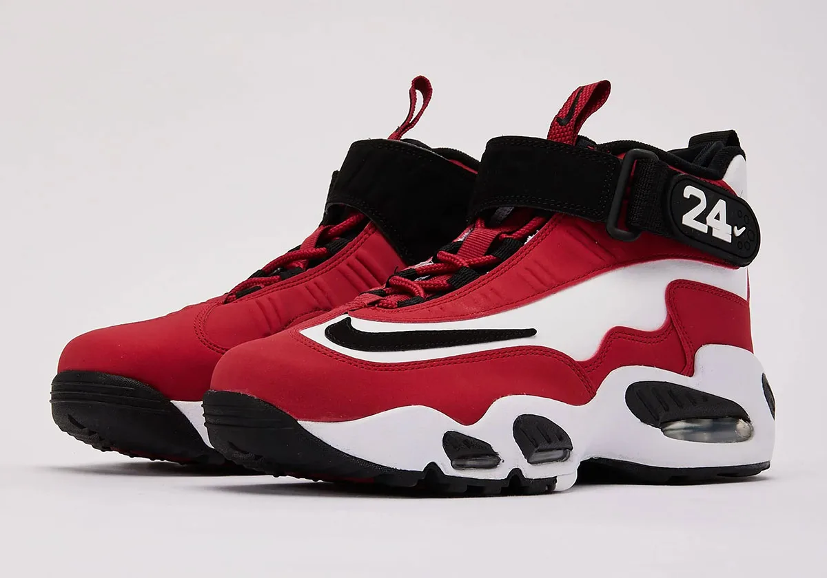 front pair view, red and white nubuck with black toe overlays and swoosh, Cincinnati Reds