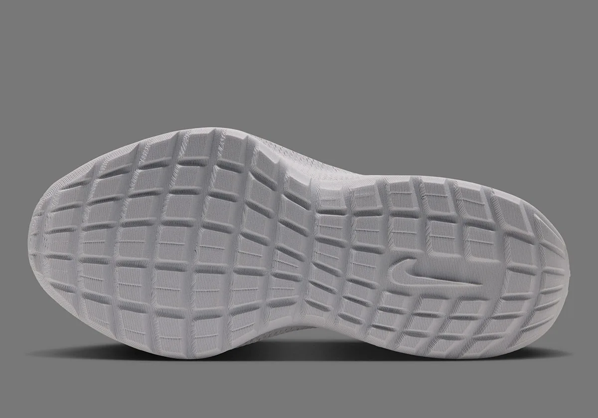 outsole view showing white ridged tread pattern and a subtle Swoosh in the arch, Air Max 1000.3
