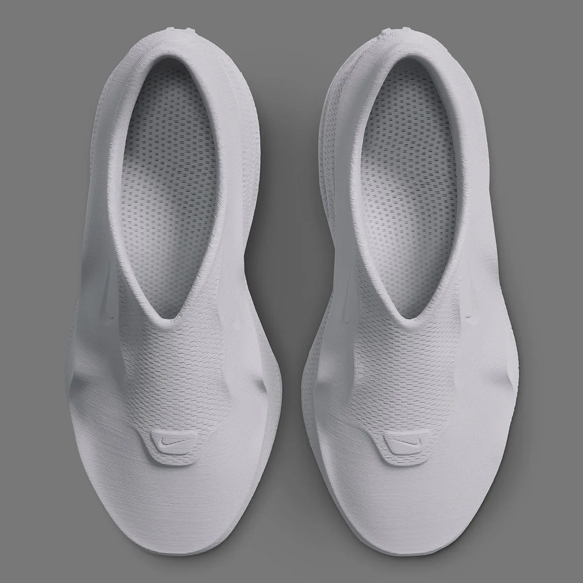 top-down view of a pair, white knit uppers with tonal Swooshes near the toe, Air Max 1000.3