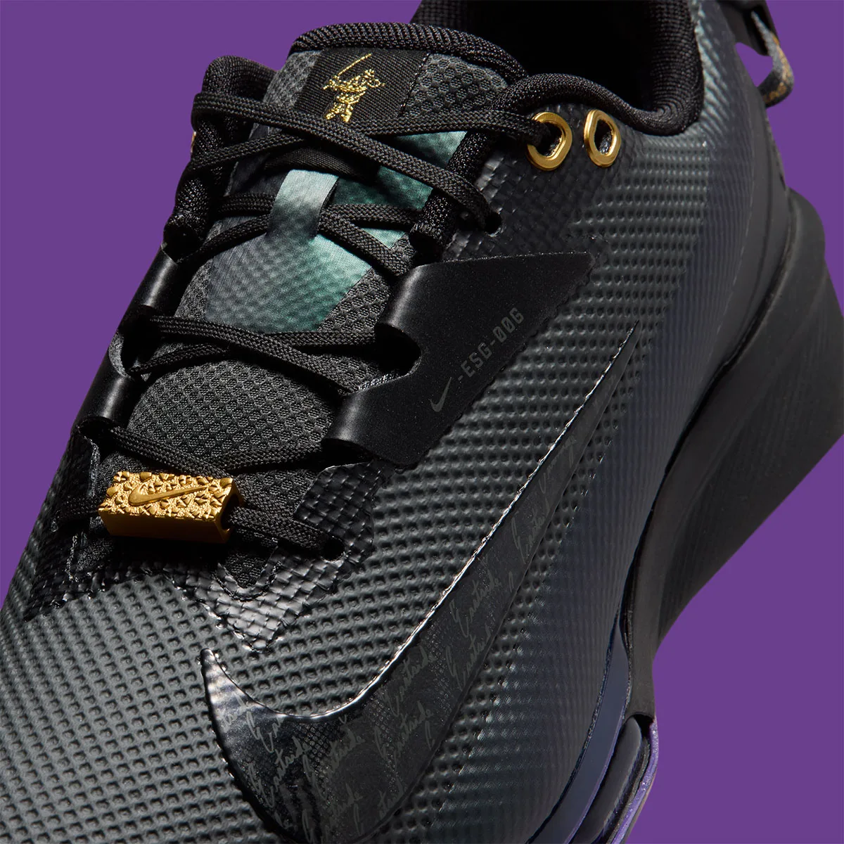 close-up detail of toe eyelets, gold lace charm, and ESG-006 branding, x Eastside Golf