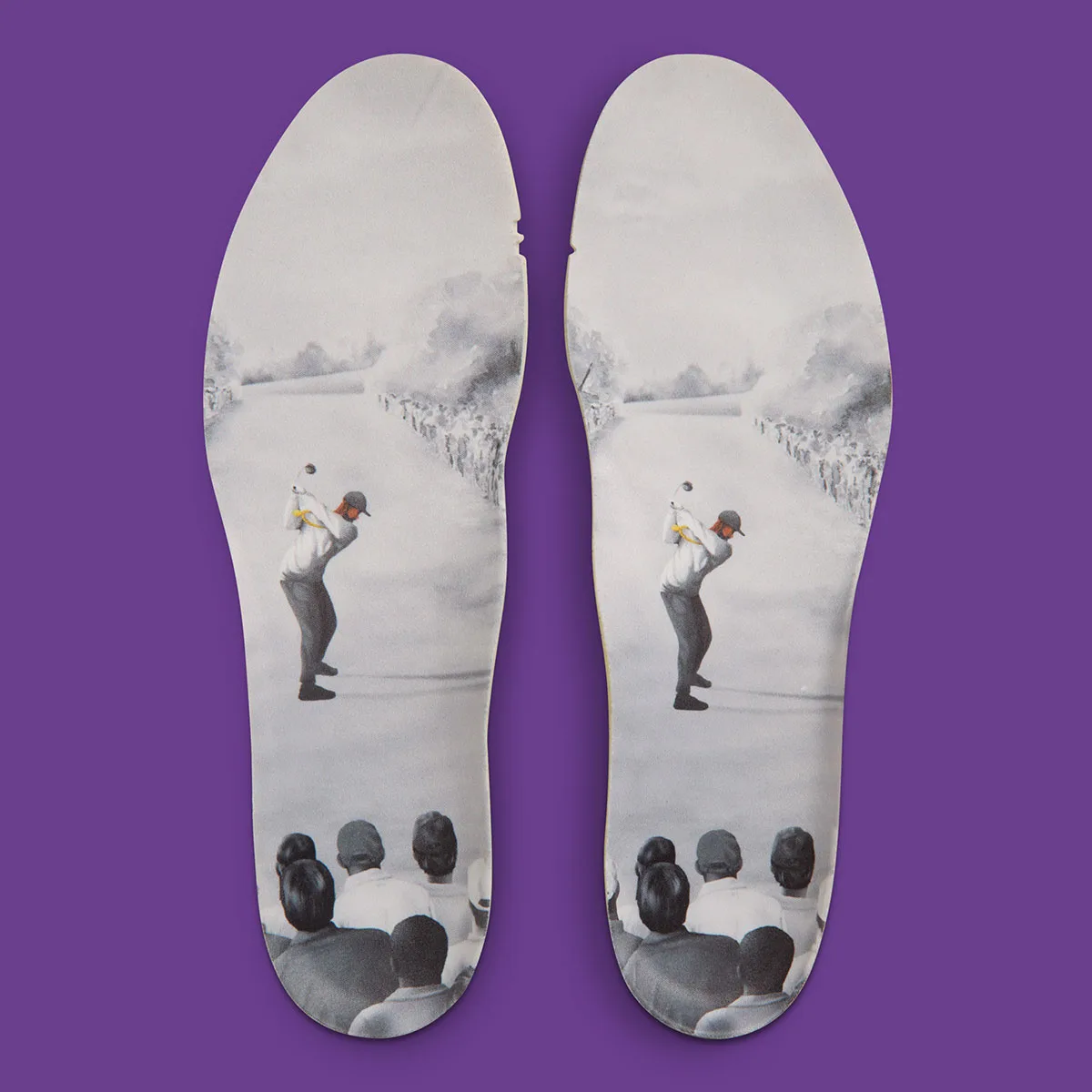 pair of insoles printed with a vintage black and white golfer and gallery scene, x Eastside Golf