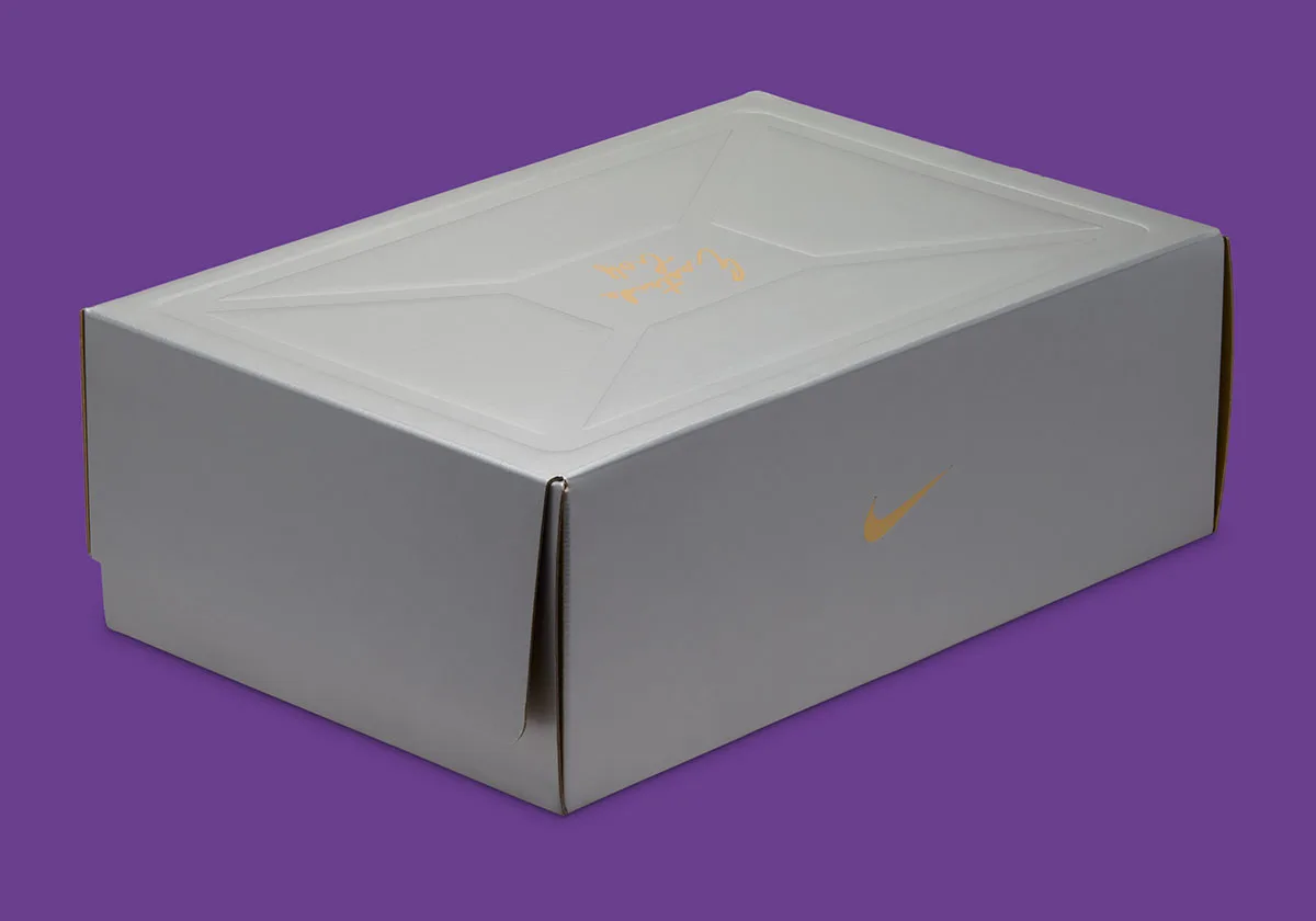angled packaging shot of silver shoebox with embossed gold Nike swoosh, x Eastside Golf